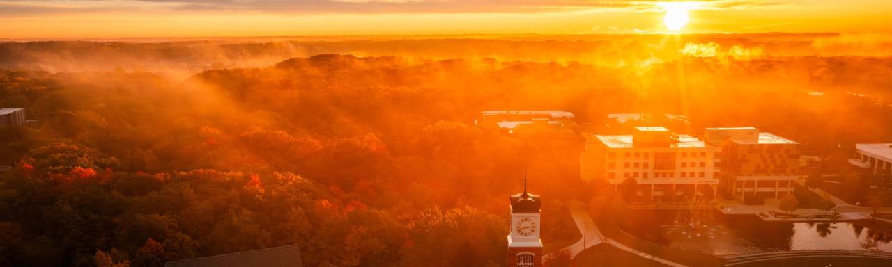 Image of sunrise over campus.